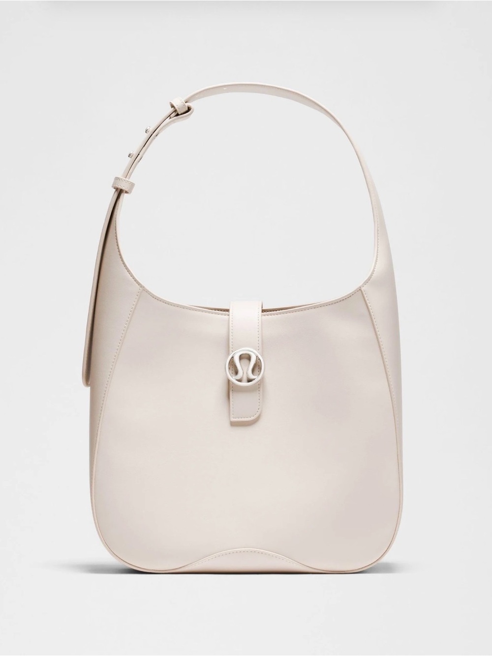 lululemon athletica Leather Alternative Cream Curved Shoulder Bag